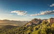 Leinwanddruck Bild - Village of Belgodere in Corsica lit by late afternoon sun