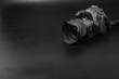 GOMEL, BELARUS - May 12, 2017: Canon 6d camera with lens on a black background. Canon is the world's largest SLR camera manufacturer.