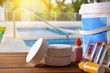Swimming pool service and chemicals and pool background