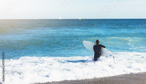 Surfer Holding Surfboard On Background Sea Scape Sand Beach Surfer Holding Surfboard On Background Sea Scape Sand Beach Coastline Panorama Horizon Perspective