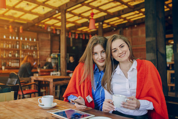 two girls in a cafe