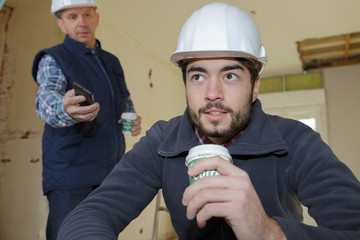 two men architects or engineers taking a break