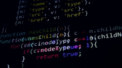 Wall Mural - 4k. computer code on display screens in a dark.