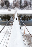 Fototapeta Do pokoju - Pedestrian suspension bridge of steel