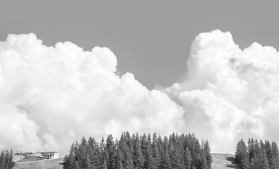 Canvas Print - Huge white clouds over the mountains in Tirol, Austria