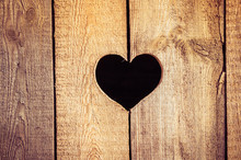 Heart In A Wooden Board