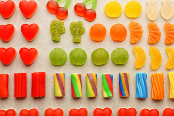 Sticker - Composition of tasty jelly candies on light background