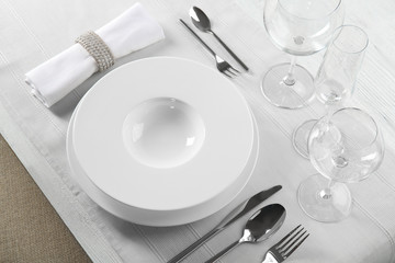 Canvas Print - Table setting with plates and cutlery, closeup