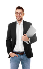 Wall Mural - Handsome young man with laptop on white background