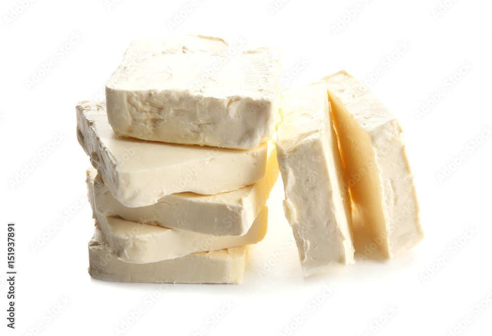 Delicious butter pieces on white background, closeup