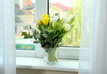 Poster - Vase with beautiful tulips on windowsill