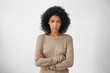 © wayhome.studio  - Angry annoyed young housewife keeping arms crossed and staring at camera with sceptical and distrustful look, feeling mad at someone. Human facial expressions, emotions and feelings. Body language