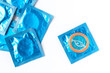 Condom packs on white background
