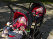 © ondrooo - sleeping twins baby in double stroller