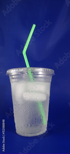 Ice Water In A Plastic Cup With A Straw Stock Photo Adobe Stock Ice Water In A Plastic Cup With A Straw Stock Photo Adobe Stock