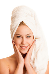 Wall Mural - skin care - beautiful young woman nurturing her skin isolated over white background