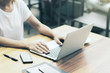 © Who is Danny - Woman using laptop