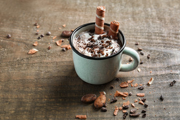 Poster - Cup of hot cocoa with marshmallows on wooden table