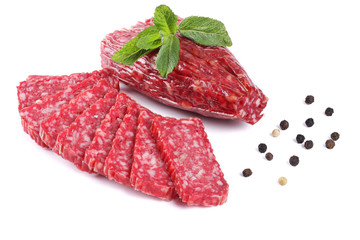 Wall Mural - Salami smoked sausage with slices and mint leaves isolated on white background cutout