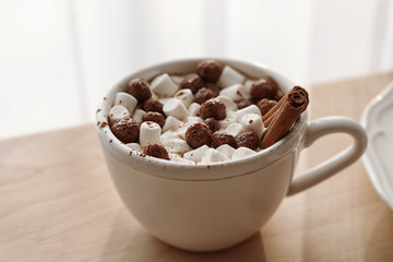 Canvas Print - Cup of tasty cocoa with marshmallow on table