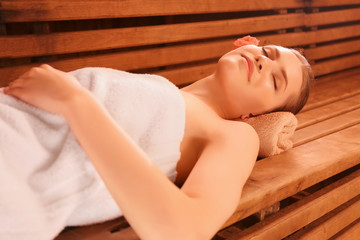 Canvas Print - Beautiful young woman in sauna