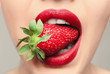 © Africa Studio - Beautiful young woman with strawberry in mouth, closeup