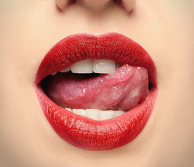 Wall Mural - Lips of beautiful young woman, closeup