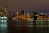Fototapeta  - New York City manhattan buildings skyline night evening