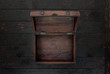 Vintage open chest close up on dark wooden table