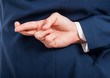 Closeup of man hand doing a cheating gesture