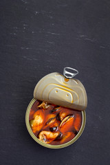 Wall Mural - mussels in iron box on black background