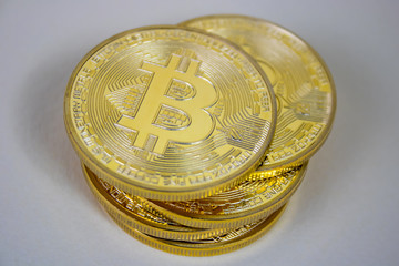 Photo Of Golden Bitcoin virtual currency coin.