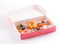 Colored Donuts With Glaze In A Box Isolated On White.