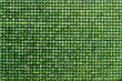 Canvas of green rhinestones. Background.