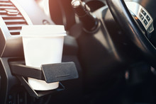 Cup Of Coffee In Cup Holder In The Car
