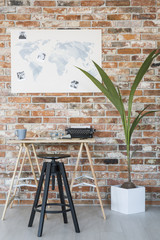 Canvas Print - Desk by the brick wall