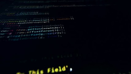 Wall Mural - 4k. programming source code running through the computer screen.
