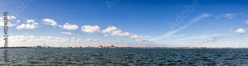 Carta da parati  Stralsund, Germany - April 2017: Panoramic view on the harbor of famous Stralsund and its historic churches on a beautiful spring day