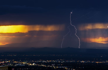 Lightning Strikes Over Albuquerque New Mexico During Sunset