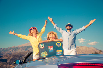 Wall Mural - Happy family travel by car in the mountains