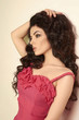 © photoagents - beautiful brunette young woman in red dress.