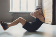 © Prostock-studio - Young man fitness workout, sit-up crunches for abs