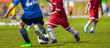 © matimix - Football Soccer Match for Children. Boys Running and Kicking Football Soccer Ball. Kids Playing Soccer Game Tournament
