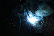 Sparks and jets of smoke when welding