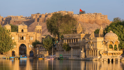 Gadi Sagar (Gadisar) Lake is one of the most important tourist attractions in Jaisalmer, Rajasthan, India. Artistically carved temples and shrines around The Lake Gadisar Jaisalmer.