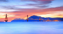 Bridge Near Patras City In Greece. Breathtaking Sunset Scenery With Epic Red Sky.