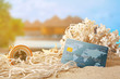 © Africa Studio - Sand with credit card and coral on white background