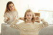 © Africa Studio - Quarrel between mother and daughter at home