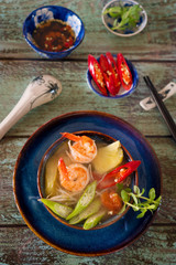 Wall Mural - Vietnamese pineapple tomato sor soup with shrimp and chili