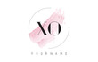 © ankreative - XO X O Watercolor Letter Logo Design with Circular Brush Pattern.